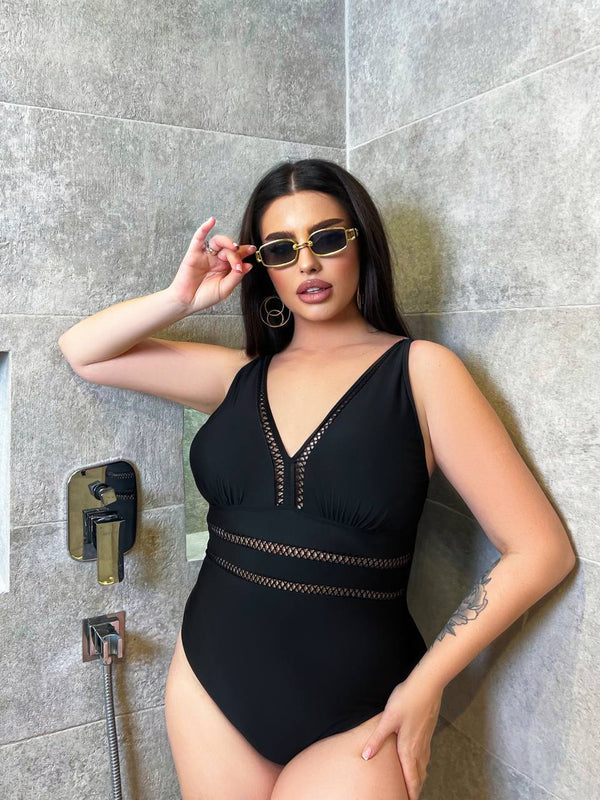 Суцільний купальник з поролоновими вкладками